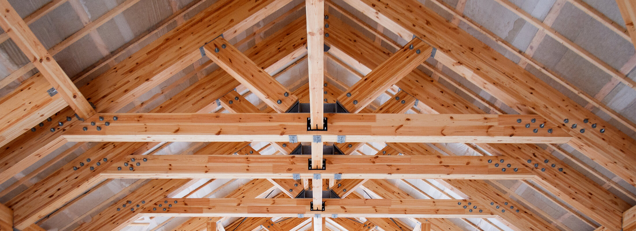 an installed wooden roof truss